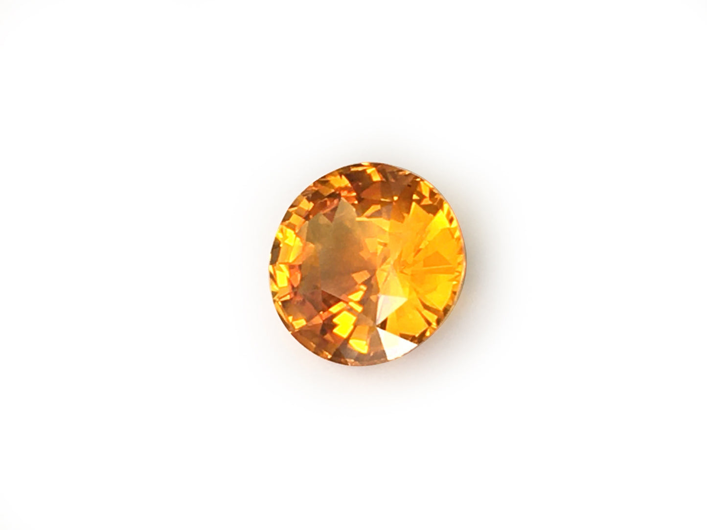 Natural Round-shape 5.53 carat Yellowish Orange Sapphire - GIA Certified