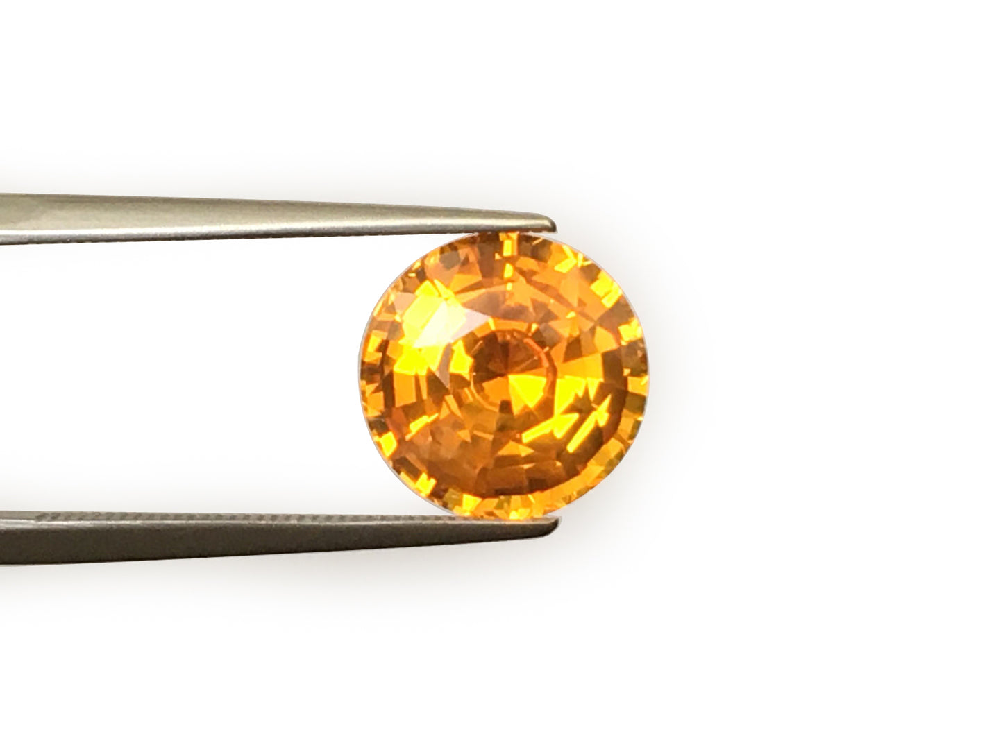 Natural Round-shape 5.53 carat Yellowish Orange Sapphire - GIA Certified