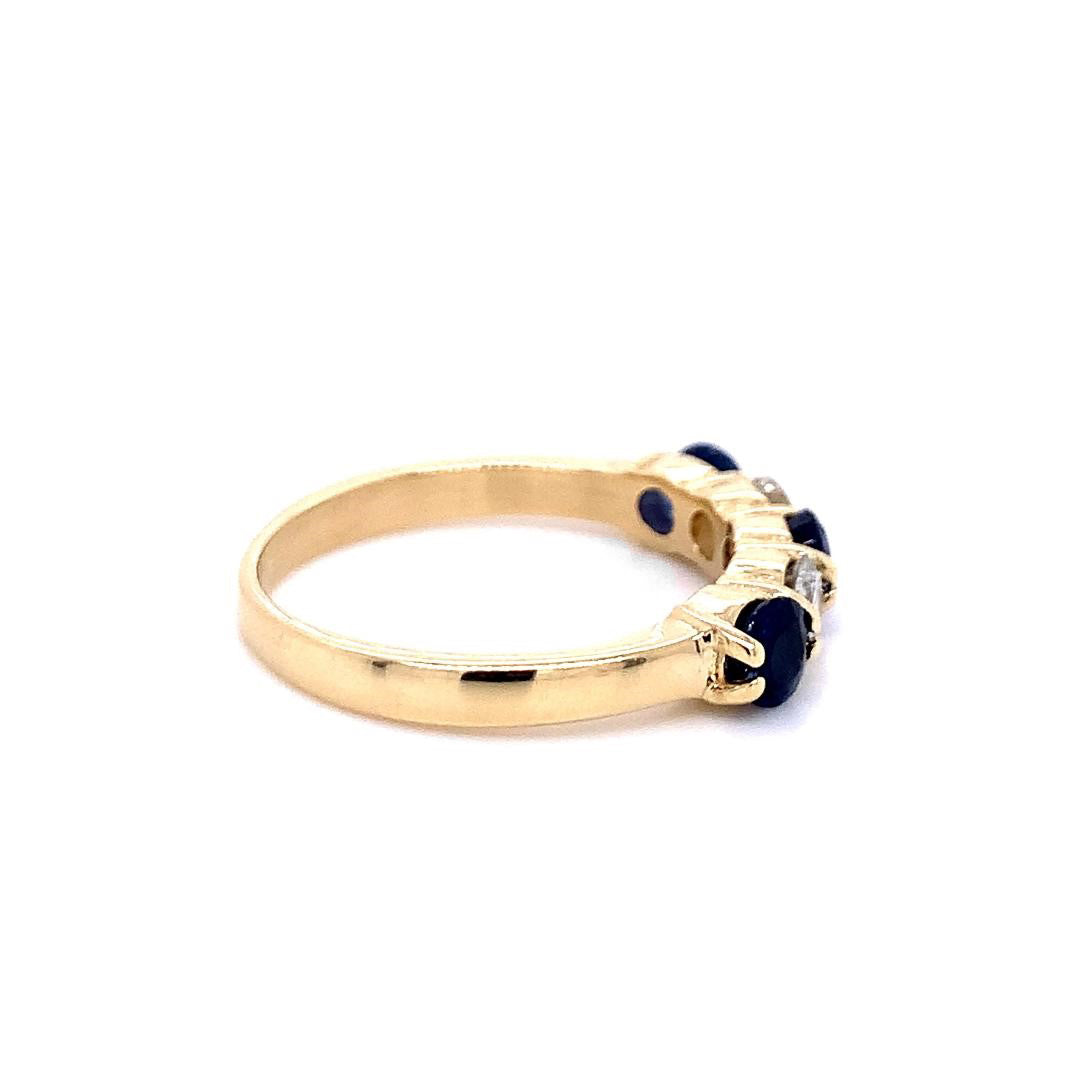 14k Yellow Gold 1.28ct TGW Blue Sapphire and White Diamond 5-Stone Ring