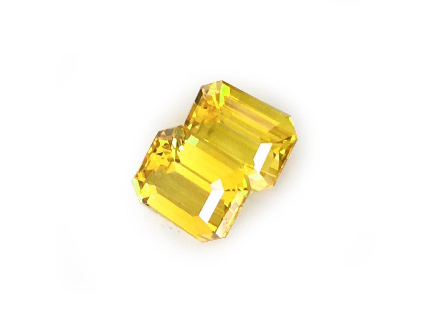 Matching PAIR of Octagonal-shape 4.12 carat Orangy-Yellow Sapphire - GIA Certified